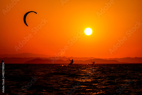 Fototapeta Naklejka Na Ścianę i Meble -  Sunset kiteboarding