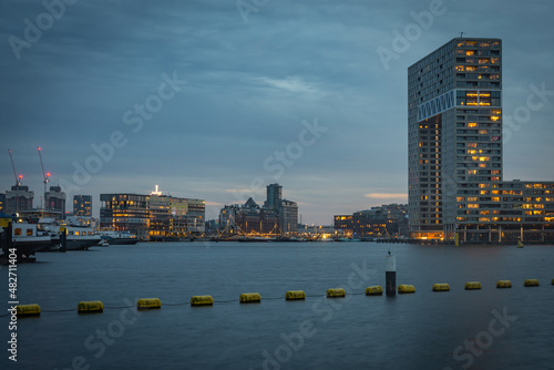 Skyline of Amsterdam at dusk from Houthaven Neighbourhood photo
