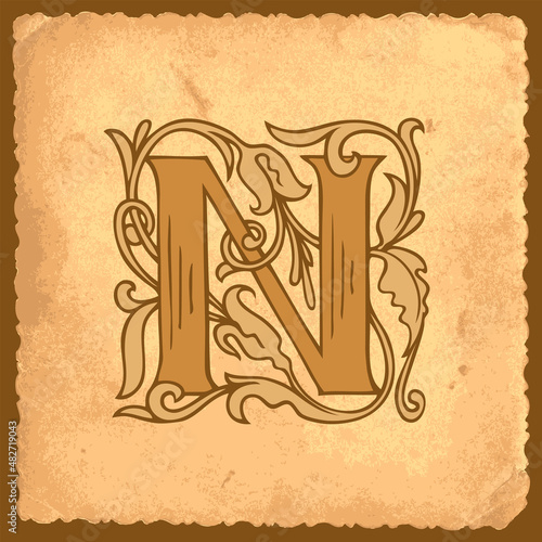 Ornate capital letter N in vintage style with fairy tale decoration on an old paper backdrop. Beautiful initial letter N suitable for monogram, logo, emblem, greeting card, invitation or label design