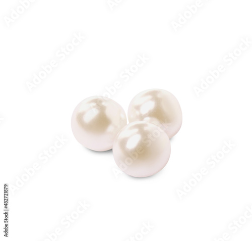 Three beautiful oyster pearls on white background