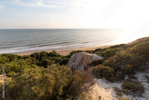 Spain's longest coastline is the coast of Huelva. From "Matalascanas" to "Ayamonte". Coast with cliffs, dunes, pine trees, green vegetation. It is considered one of the most beautiful beaches in Spain