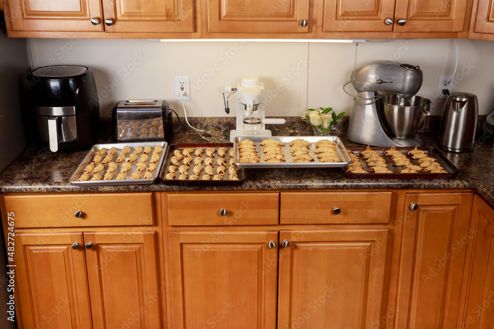 Kitchen cabinets and kitchen tools with baked cookies. Kitchen cabinets and kitchen tools with baked cookies.