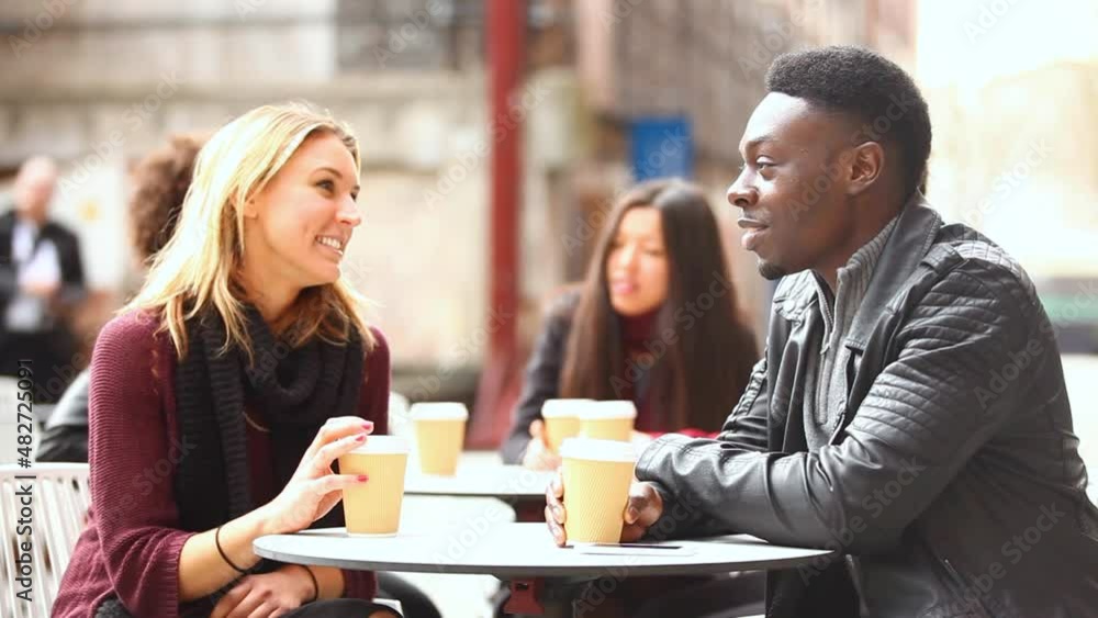 Authentic shot of people in a cafe, meeting, talking and using phones Authentic shot of people in a cafe, meeting, talking and using phones