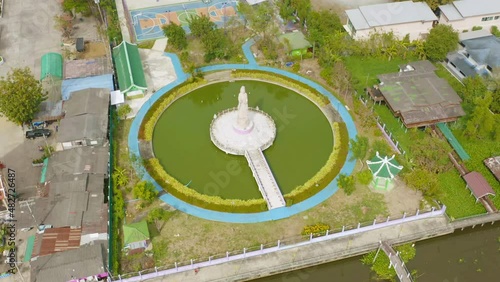 Aerial top view of goddess Guan Yin Shrine, Fo Guang Shan Thaihua Temple, Bangkok City, Thailand. Tourist attraction landmark. photo