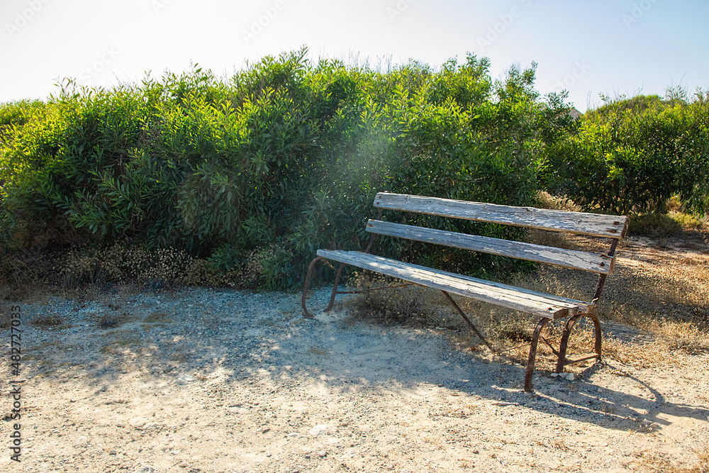 beautiful bench near the sea shore on nature background beautiful bench near the sea shore on nature background