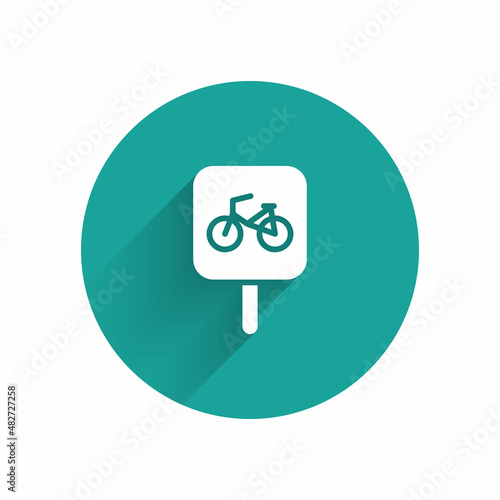 White Bicycle parking icon isolated with long shadow. Green circle button. Vector