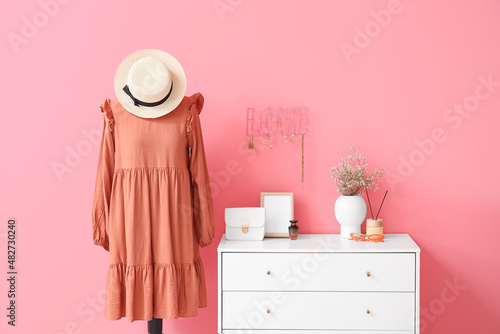 Mannequin with dress and ch...