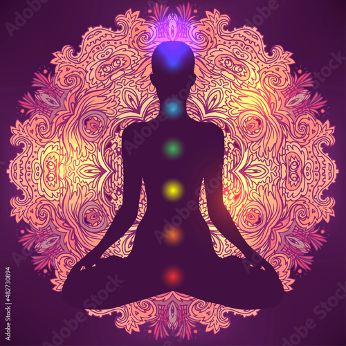 Woman ornate silhouette sitting in lotus pose. Meditation, aura and chakras. ...