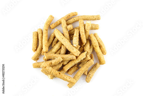Group of salty peanut cracker sticks isolated on white background