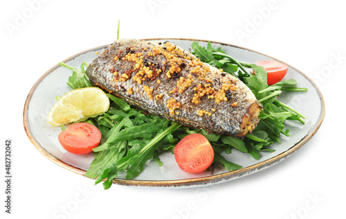 Plate with delicious sea bass fish and vegetables on white background