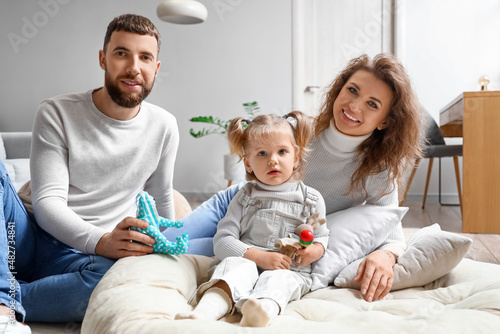 Happy young family spending...