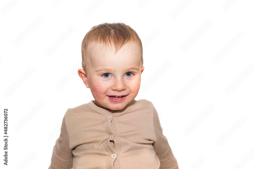 One and half year smiling boy on white background