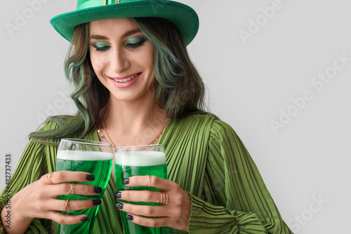 Stylish young woman dressed...