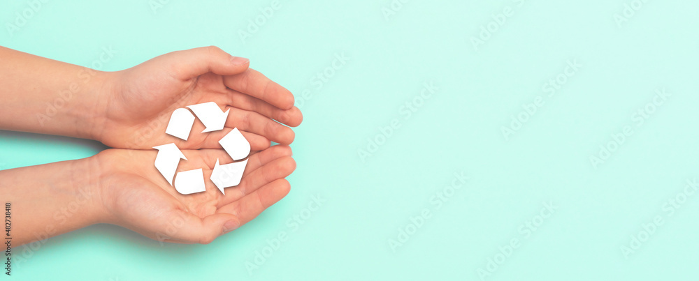 Recycling symbol in hand. Ecology concept Recycling symbol in hand. Ecology concept