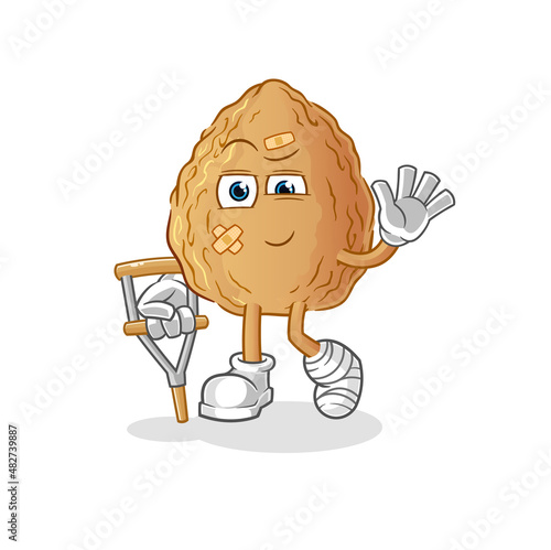 almond sick with limping stick. cartoon mascot vector
