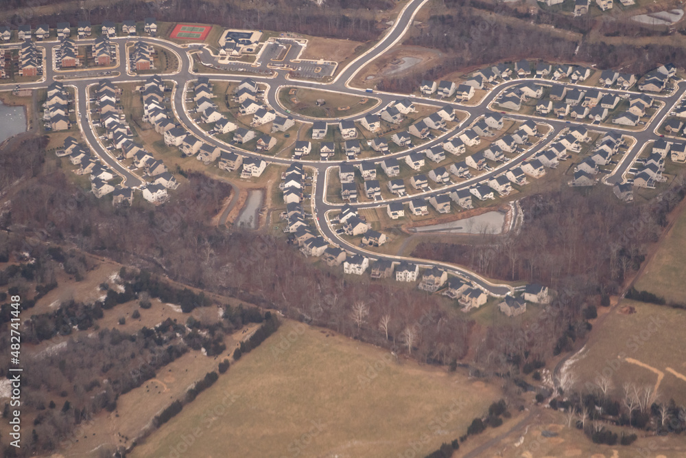 Aerial view of suburban homes and subdivisions in the United States.     