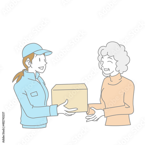 荷物を手渡す配達員