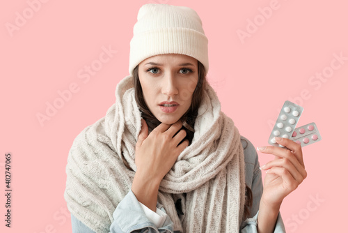 Young woman with sick throa...