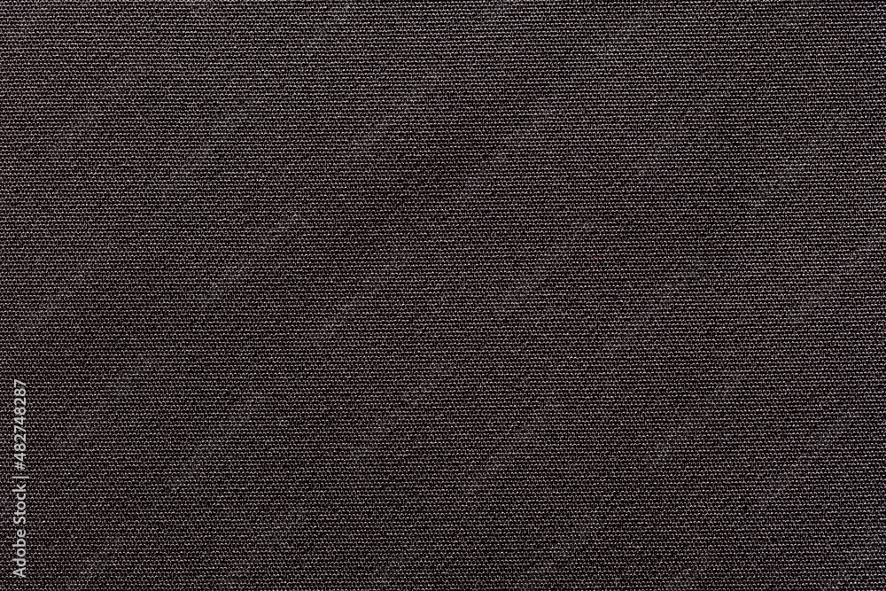 Fototapeta premium Fabric background with a black fabric cloth polyester texture.