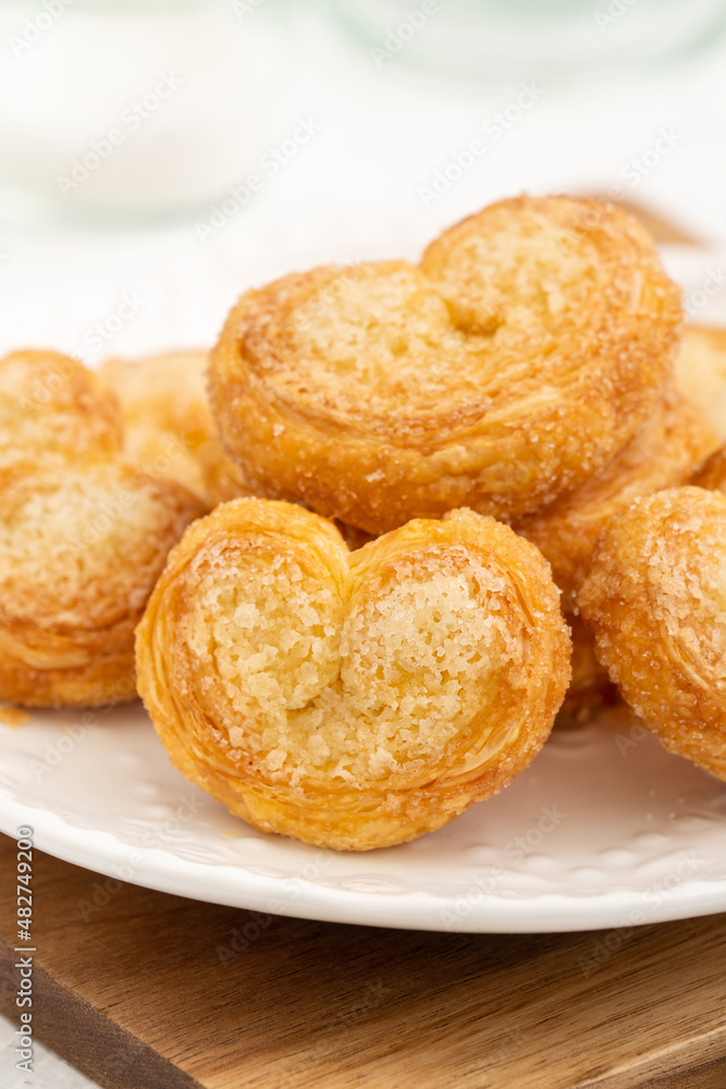 Delicious Palmier butterfly pastry in heart shape for Valentine's day dessert.