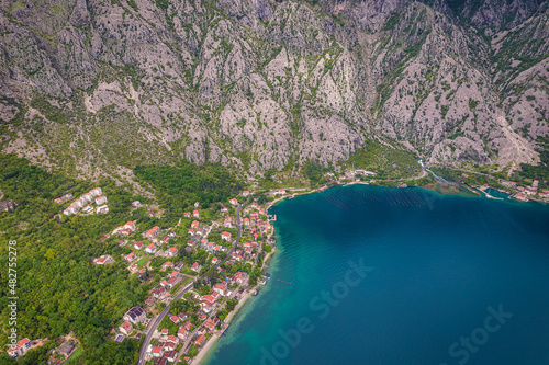 Fototapeta Naklejka Na Ścianę i Meble -  Aerial view of huge mountains and small towns of Kotor Bay, Montenegro