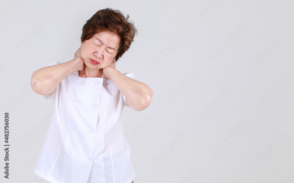 Elderly aunt stand tilt and twist with hands on waist as disappointed on body disease and tired of back pain