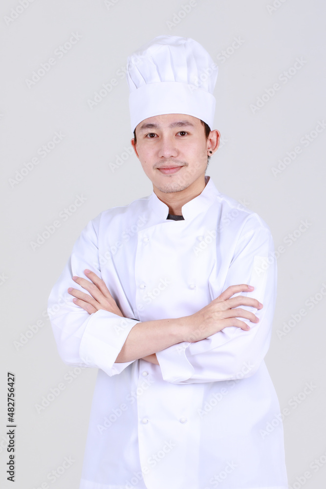 Experienced and smart chinese chef on elegant cooking uniform smile and