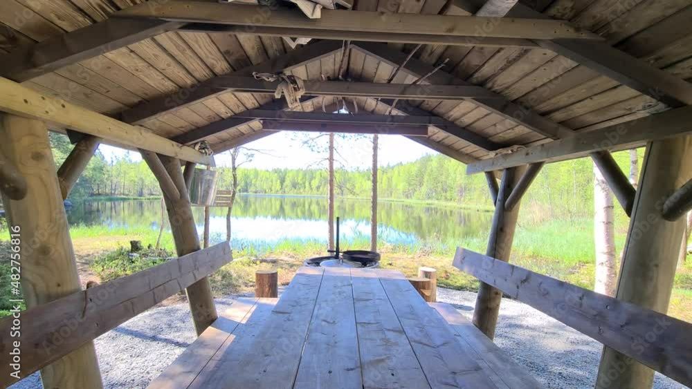 Forest trail hiking camp by a lake in Koli, Northern Finland