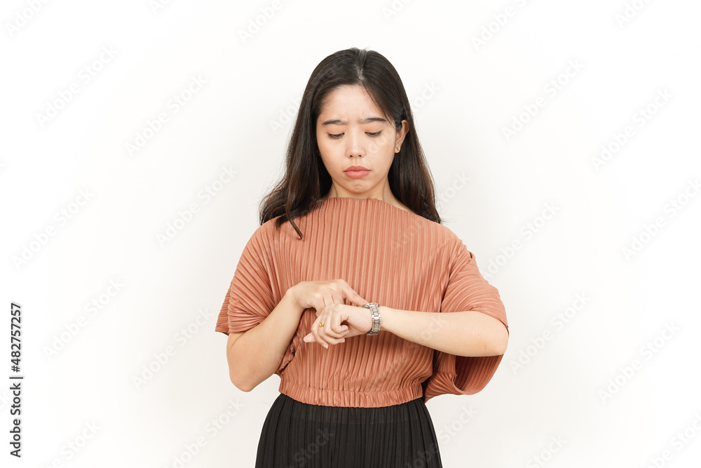 Looking at the watch and get late Of Beautiful Asian Woman Isolated On White Background Looking at the watch and get late Of Beautiful Asian Woman Isolated On White Background
