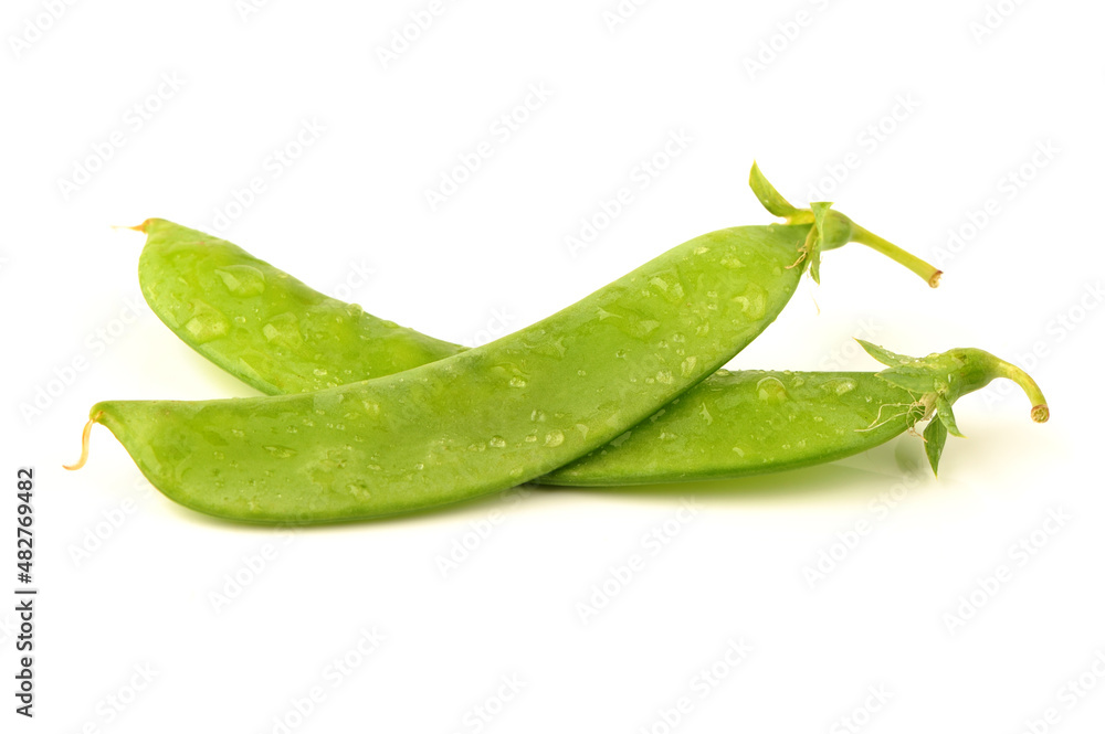 snow peas on white. snow peas on white.