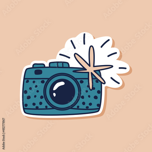 Drawn blue camera doodle sticker. Travel camera isolated sticker. Vector illustration photo