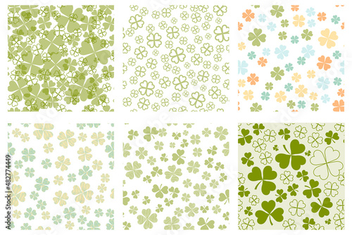 Set of Abstract seamless pattern with green shamrock shapes