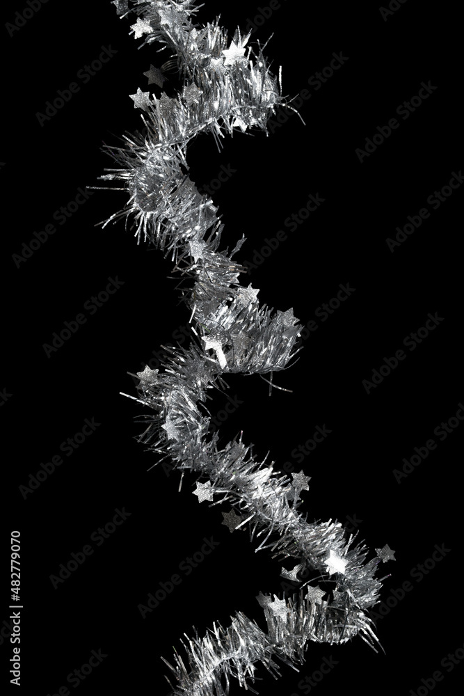 Silver tinsel on black Silver tinsel on black