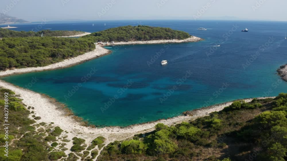 Lush Vegetation And Scenic Beach At Paklinski Island With Crystal Blue Water In Hvar, Croatia. - aerial