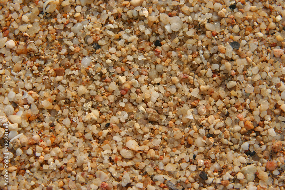 Close up of stones and marble. Smooth and polished. Pebble on shingle beach. Colorful small pebble and stone texture. Pebble background. Gravel pebble or rock fragments, beach sand Close up of stones and marble. Smooth and polished. Pebble on shingle beach. Colorful small pebble and stone texture. Pebble background. Gravel pebble or rock fragments, beach sand