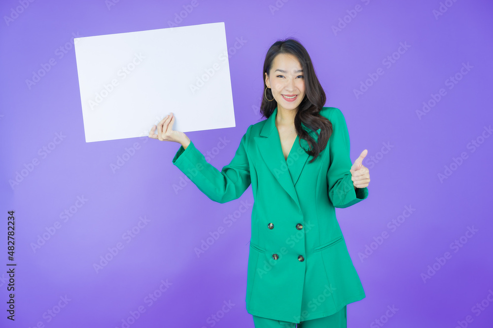 Portrait beautiful young asian woman with empty white billboard Portrait beautiful young asian woman with empty white billboard