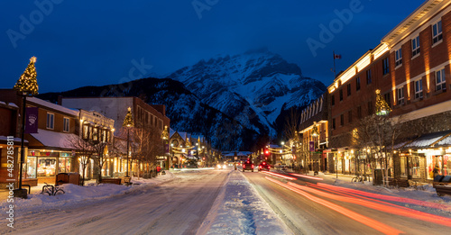 Town of Banff, Alberta, Canada - January 10 2022 : Downtown Banff Avenue in winter night.