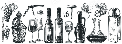 Set of wine glasses, bottle, decantor and grape. Vintage vector engraving illustration for web, poster, invitation to party. Hand drawn design element isolated on white background.