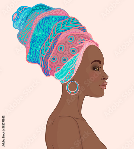 Portrait of beautiful African woman in turban (profile view)