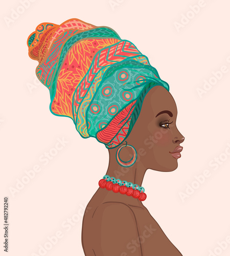 Portrait of beautiful African woman in turban (profile view)