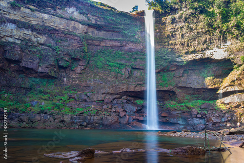 waterfall falling streams from mountain top with reflection from different perspective