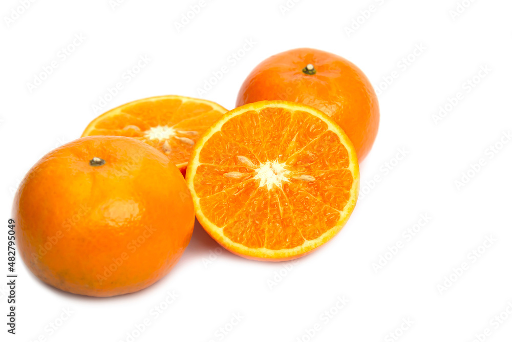 Fresh juicy orange fruit set over white background - tropical orange fruit for background use Fresh juicy orange fruit set over white background - tropical orange fruit for background use
