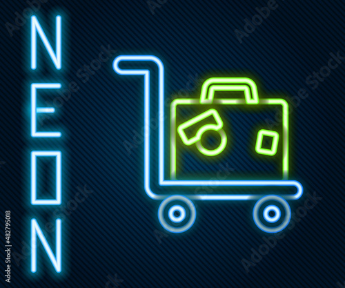 Glowing neon line Hotel luggage cart with suitcase icon isolated on black background. Traveling baggage sign. Travel luggage icon. Colorful outline concept. Vector