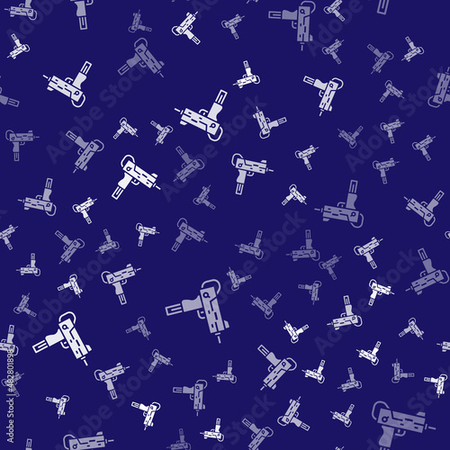 White UZI submachine gun icon isolated seamless pattern on blue background. Automatic weapon. Vector