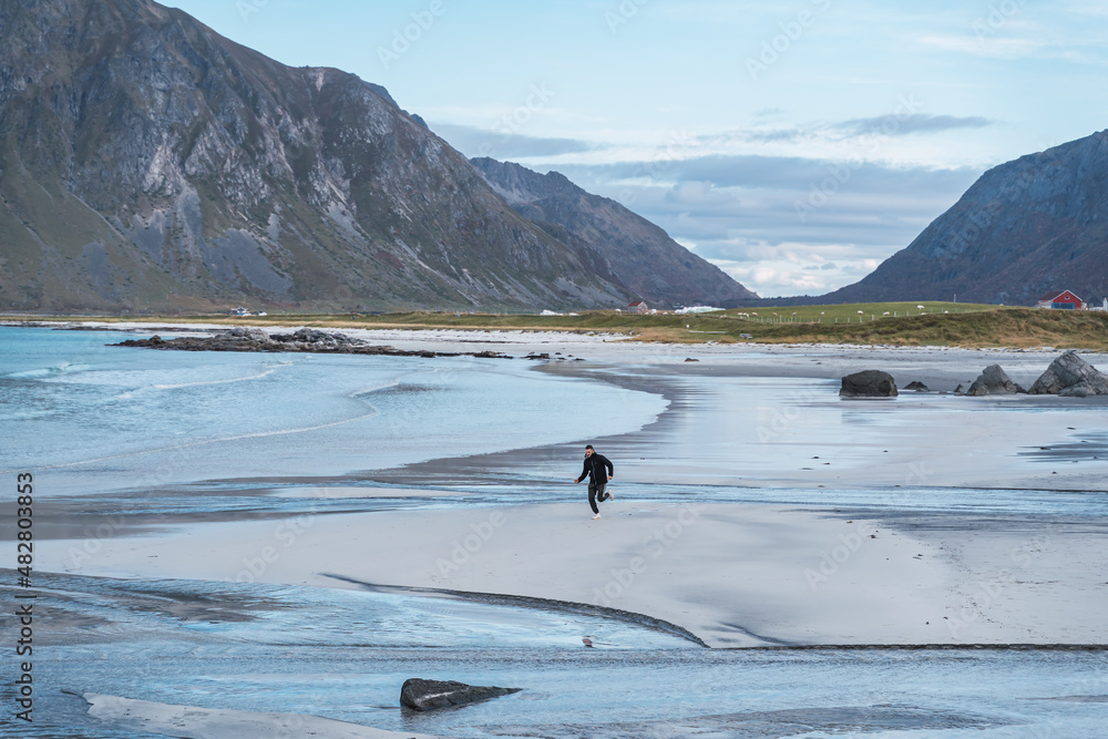 Man running on a Norwegian beach
