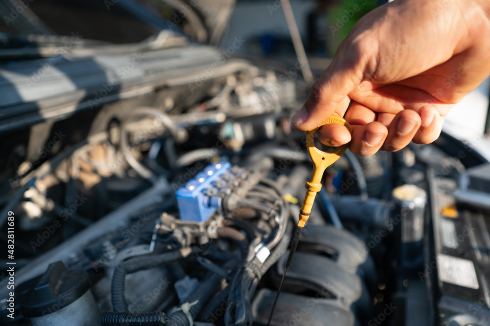 automotive oil level gauge.soft focus.shallow focus effect. automotive oil level gauge.soft focus.shallow focus effect.