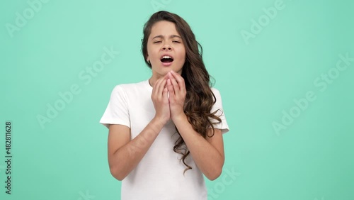 teen girl long curly hair sneezing with smiling face, sneeze photo