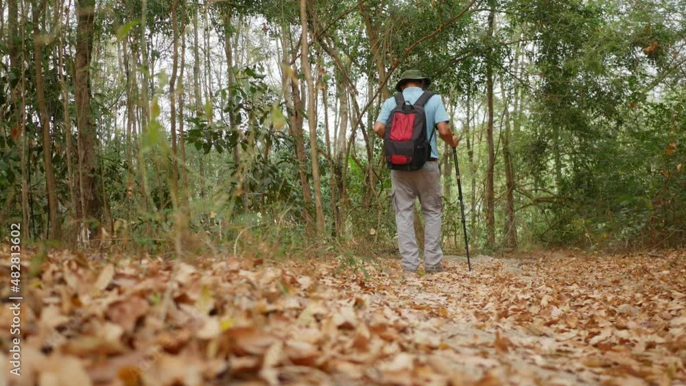 Man hiking in the mountain on vacation summer season, Holiday and outdoor activity concept Man hiking in the mountain on vacation summer season, Holiday and outdoor activity concept