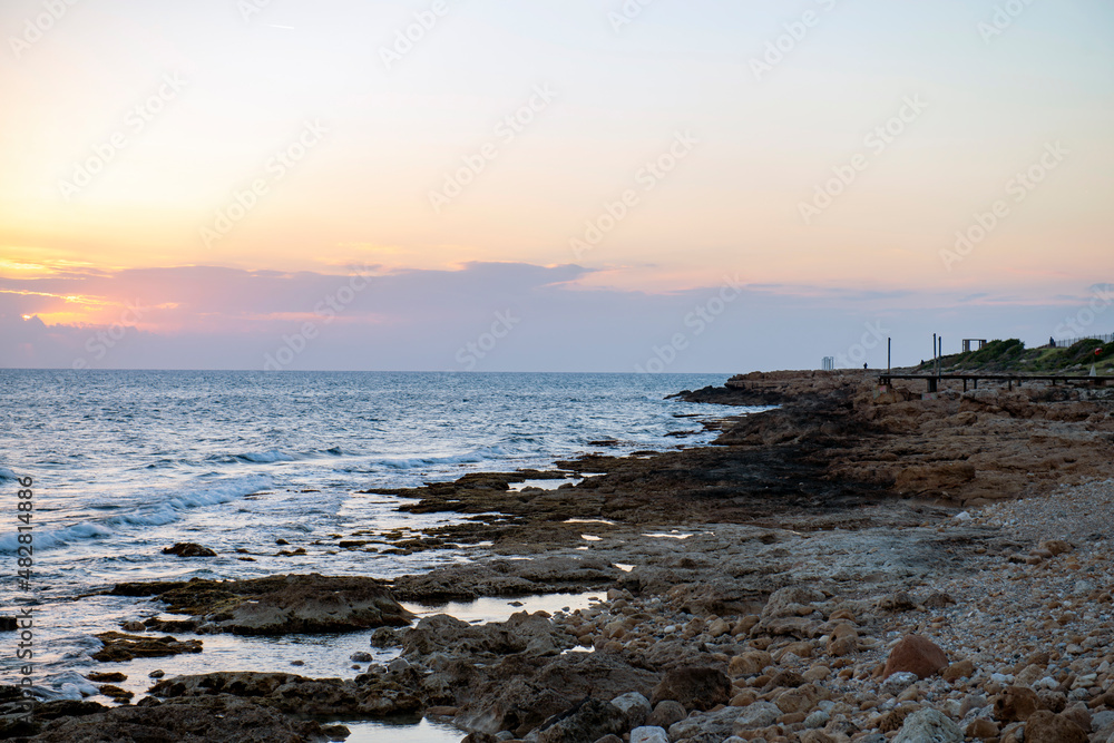 Obraz premium Winter sunset in Cyprus on the coast of Paphos 