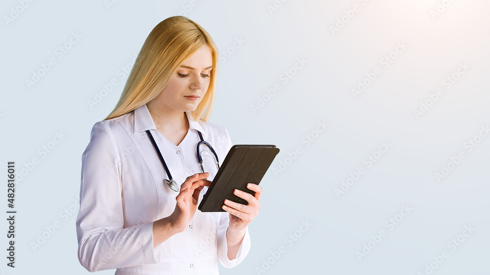 Healthcare, medicine concept: Femal Doctor thinking about diagnosis on tablet computer isolated over grey color 